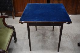 A traditional folding card table