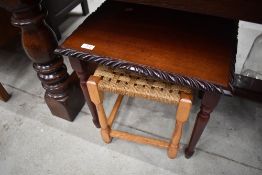 A reproduction mahogany occasional table (ex nest)
