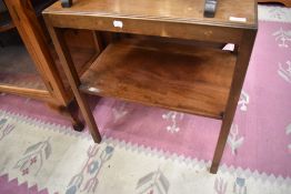 A vintage mahogany tea table of rectangular form with undertier, approx. 61 x 41cm, and a