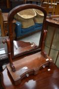 A 19th Century mahogany toilet mirror