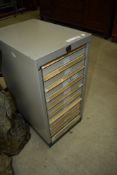 A set of vintage metal filing drawers