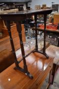 An Edwardian mahogany part nest table