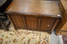 A mid to late 20th Century oak and ply bedding box