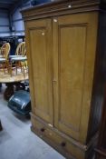 A 19th Century scumbled wardrobe having single drawer base, width approx. 114cm
