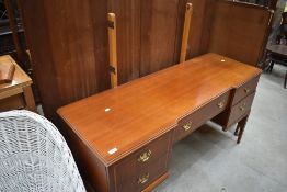 A Stag or similar dressing table (no mirrors)