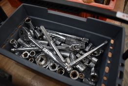 A plastic container of sockets etc, metric