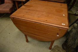 A natural pine drop leaf kitchen/breakfast table, approx. 80 x 75cm