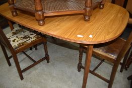 A vintage style oval dining table