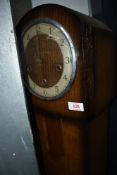 A traditional oak 'grandmother' clock, dial named Enfield
