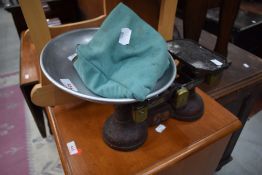 A set of traditional avery balance scales with weights