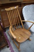 A beech rocker, probably Ercol though unmarked apart from a faint stamp