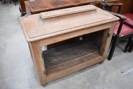 A period style limed oak cabinet, of casket form