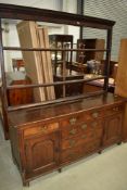 A period oak dresser and delft rack, possibly marriage but very complimentary, width approx. 175cm