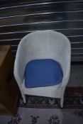 A vintage Lloyd Loom tub chair