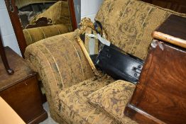 A modern settee in the traditional style, having turned legs and brass castors, looks a nice