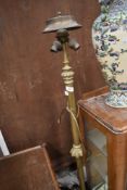 An Antique brass standard lamp