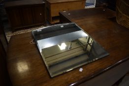 A vintage frameless wall mirror, width approx. 46cm