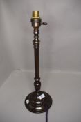 An antique heavy cast brass lamp base