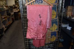 Two vintage 1930s/40s embroidered taffeta bed throws, both having floral designs.