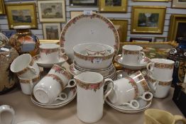A collection of Alfred Meakin tea service including plates, cups and saucers and more.