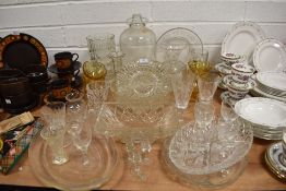 A selection of glass wares including amber bowls and spirit glasses