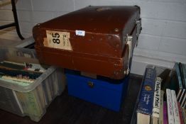 Two vinyl record cases and a similar suitcase