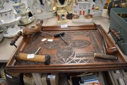 A selection of treen including carved tray, pipe, and corkscrew including horn handled example.