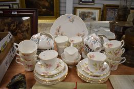 Two partial tea services including Springfield having Foxglove design and Royal Adderley Opehelia.