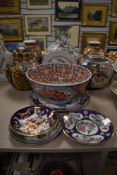 A assortment of oriental ceramics including ginger jar, bowl, vase and more.
