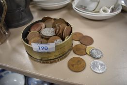 A tin of collectable coins.