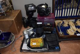 A selection of photographic equipment and cameras including Olympus and Cannon