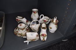 A selection of ceramic decorations by Royal Albert in the Old Country Roses design