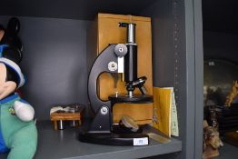 A scientific Biomicroscope XSC-04 microscope with case and lens's