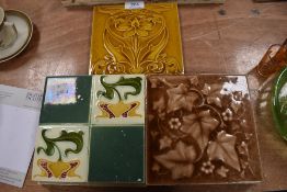 A selection of embossed and glazed Victorian tiles
