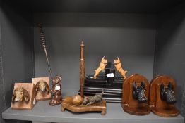 A selection of Scotty and Westie dog book ends and fire pokers