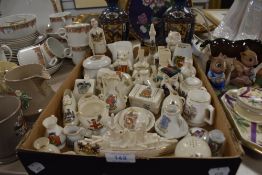 A good assortment of crested ware including HMS Queen Elizabeth battle ship, Ambleside elephant
