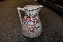A large jug having red transfer pattern, marked underside H&B Fern.