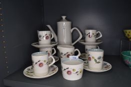 A vintage mid century Crown Clarence coffee set having floral pattern to white ground and blue