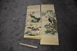 Two oriental wall hangings, possibly silk or silk blend.AF.
