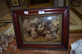 A framed Victorian Crystoleum depicting children and dog at play.
