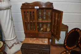 A vintage kitchen spice cupboard and similar treen case