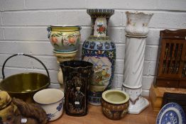 A selection of ceramic planters and plant stands