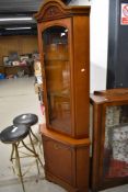 A reproduction corner display, Rossmore cherry or similar
