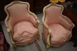 A pair of French Louis XV style easy chairs