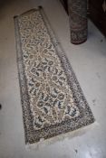 A Persian carpet runner, approx. 286 x 90cm