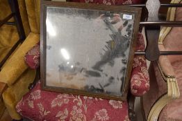 An oak framed wall mirror
