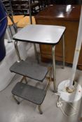 A vintage folding step stool