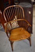 A Stewart Linford stick back arm chair chair in Ash and Yew wood