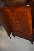 a modern reproduction media centre cabinet