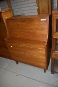 A vintage teak bureau